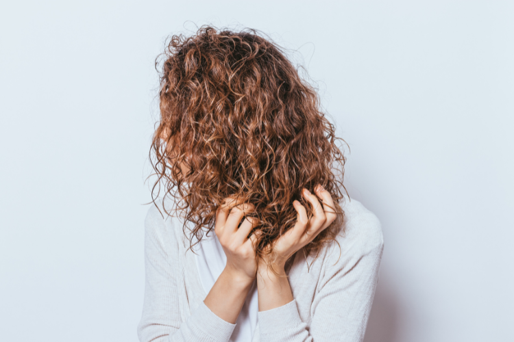 scrunch the curls and push them upwards