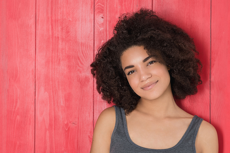 curly hair is more assymetrical than permed curls