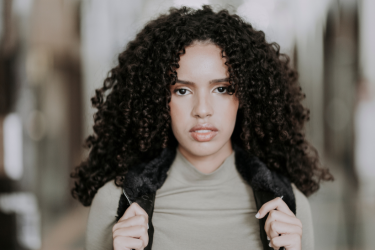 curly hair woman who has curly hair roots